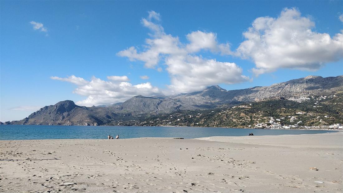 The grey-sand bay of Plakias on the south coast of Crete, backed by the mountains of the Rethymno region