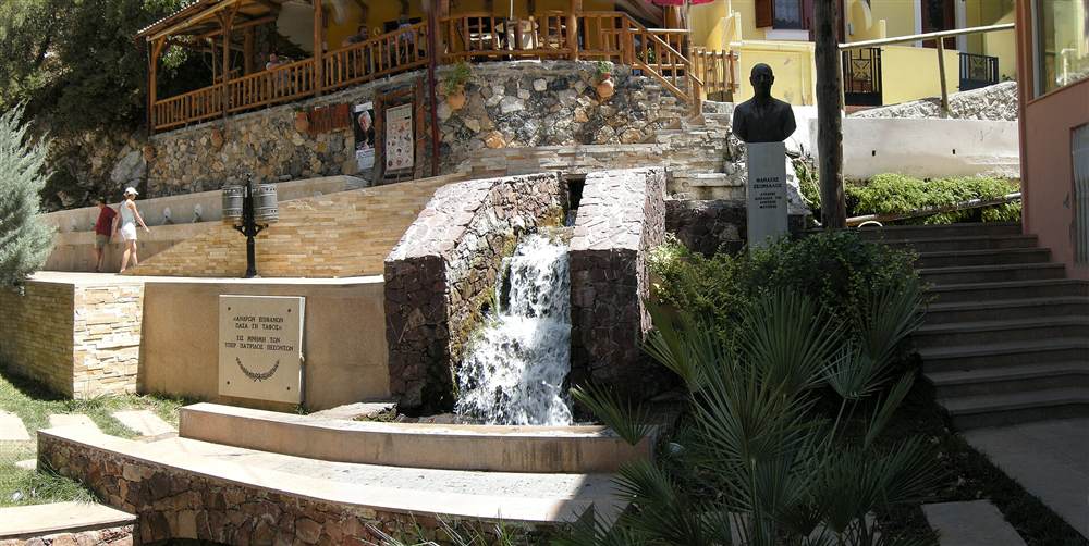 The plane-shaded village square of Spili with its running spring water in the Rethymno mountains of Crete
