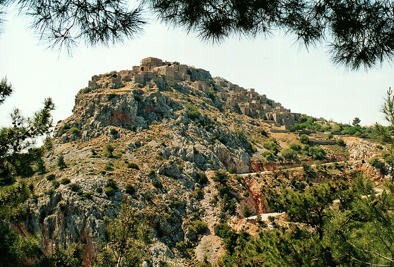 The ghost village of Anavatos rising in tiers of grey stone up its cliff in central Chios