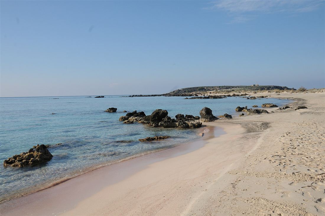 The pink coral sand of Elafonisi beach in south-west Crete
