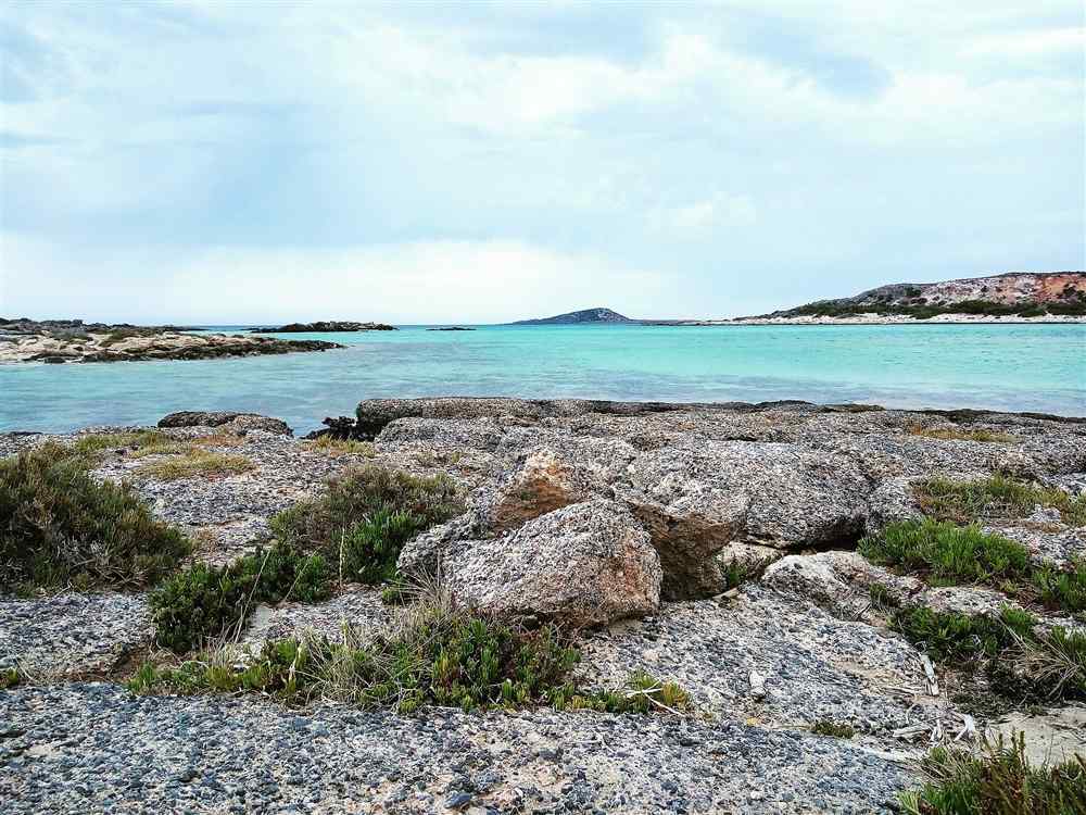 The pink-tinged sand and the islet of Elafonisi in south-west Crete