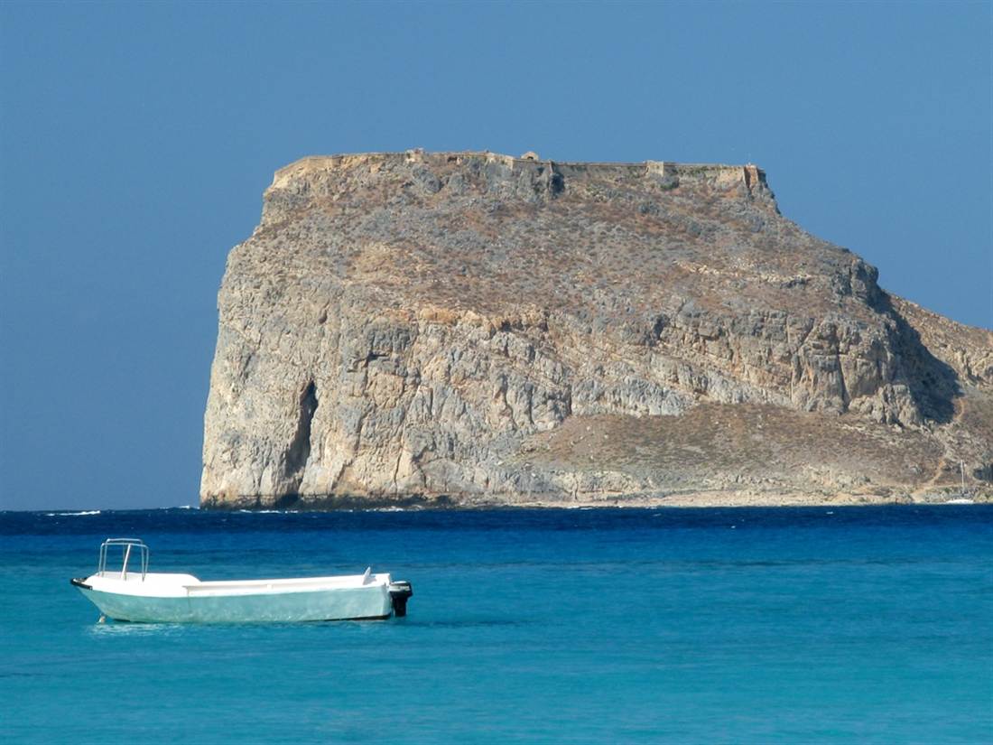 Gramvousa island and its Venetian fortress over the turquoise Balos lagoon, a day trip from Chania