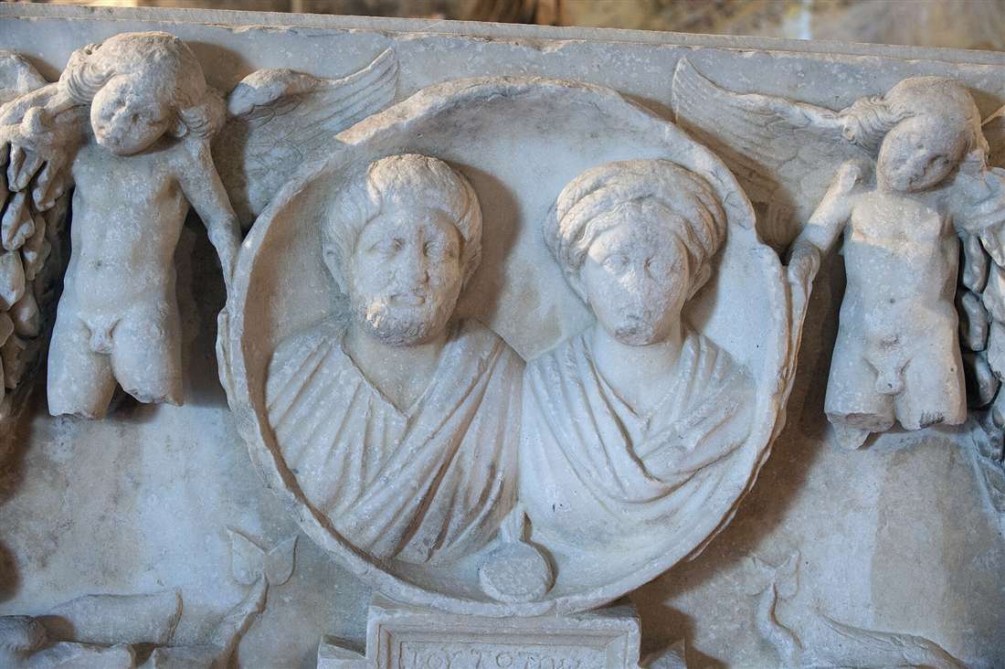 A garlanded sarcophagus relief with portrait busts in the Hierapolis Museum