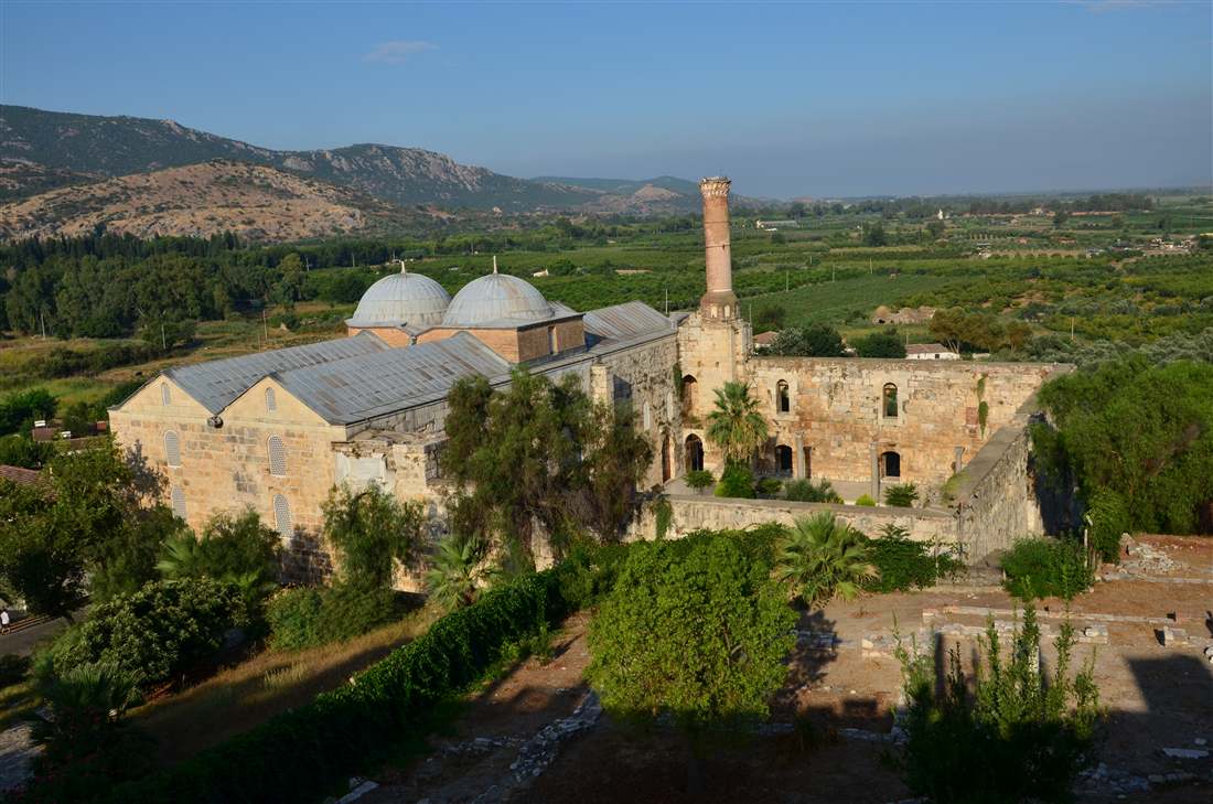 Isa Bey Mosque with its twin domes and minaret above the Selcuk plain near Ephesus