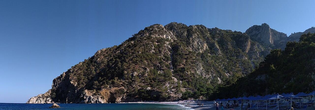 Apella beach on Karpathos, a pine-clad cove with turquoise water on the east coast