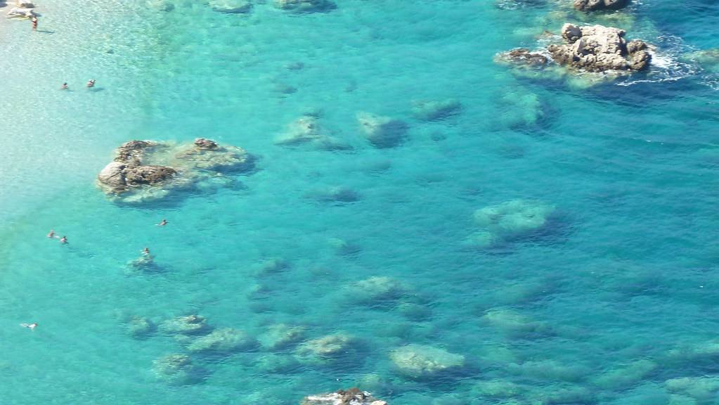 The exceptionally clear, shallow water of the Karpathos coast, with the seabed visible