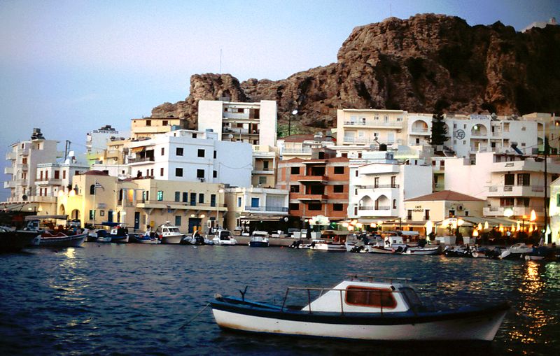 The harbour of Pigadia, the capital of Karpathos, at dusk with fishing boats