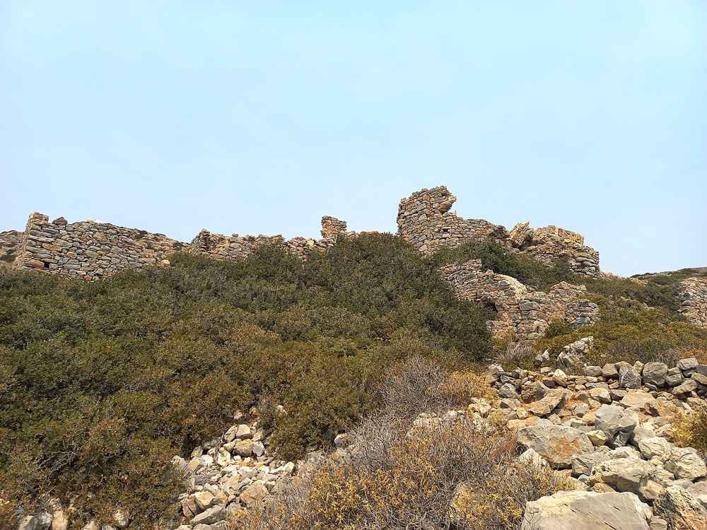 The stone ruins of the ancient settlement on the islet of Saria, off Karpathos