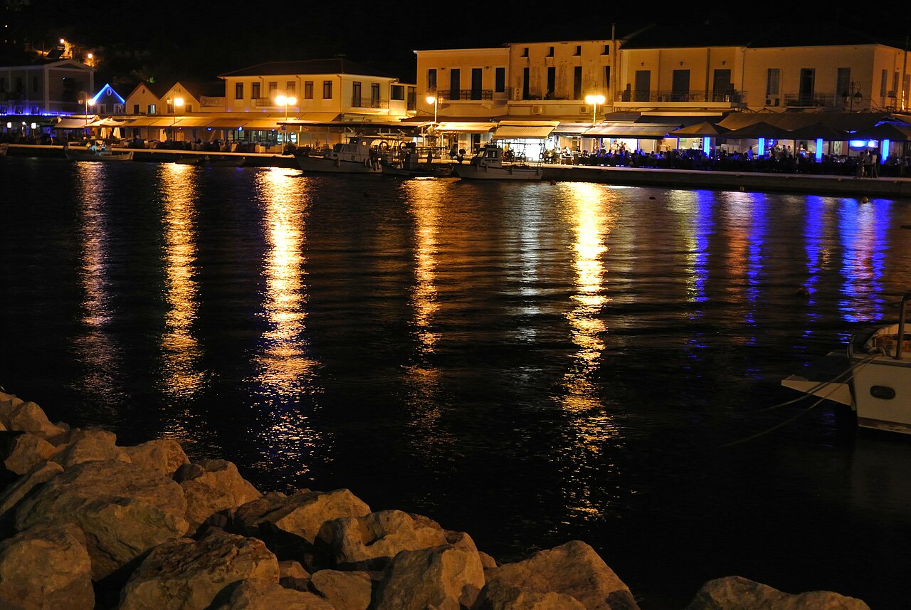 The harbour of Katakolo port lit up at night, the cruise gateway to Ancient Olympia