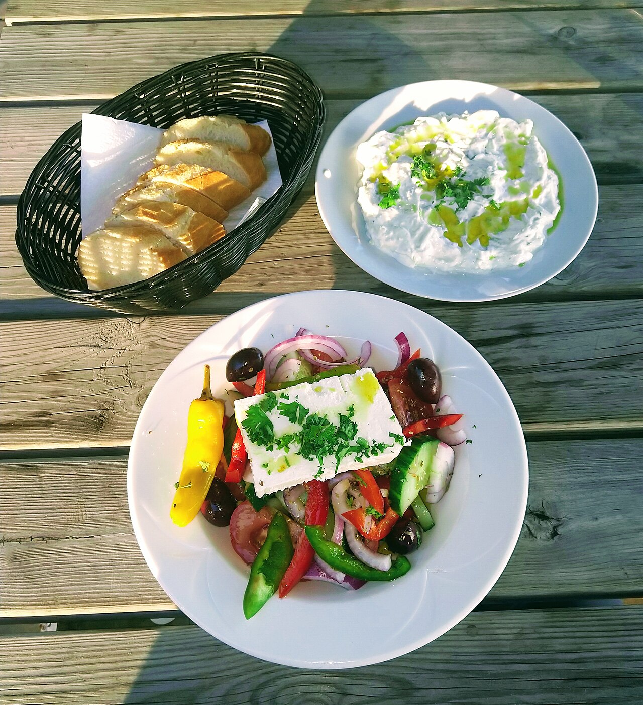 Greek salad and tzatziki, staples of a Nafplio taverna table