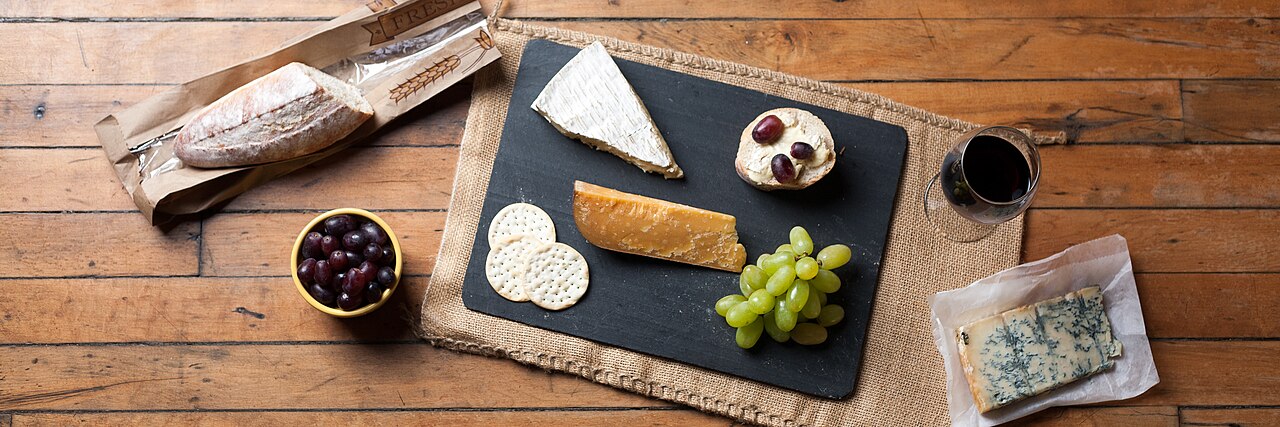 A wine and cheese platter, tasted on a Nafplio food tour
