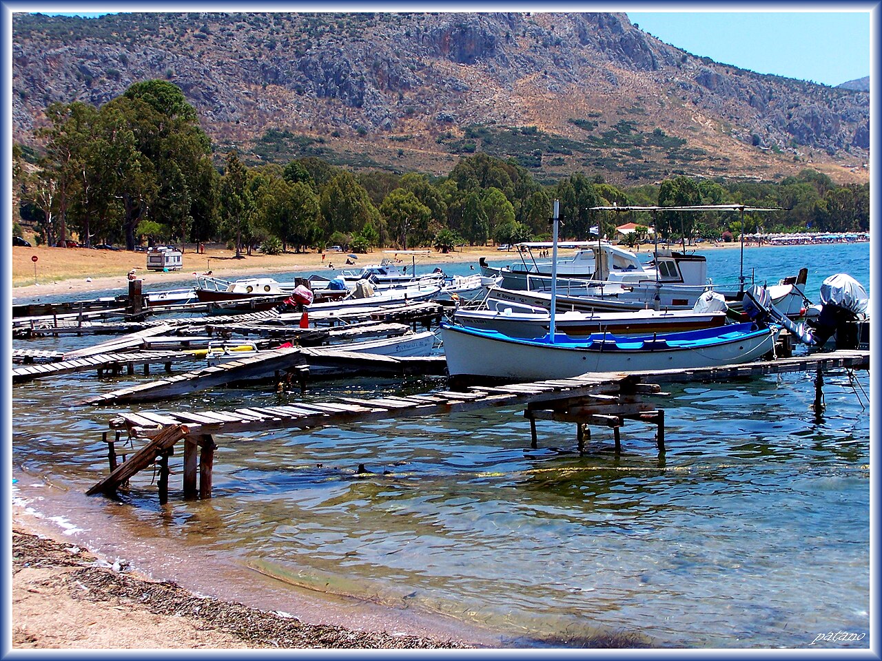 Golden sand and calm water at Karathona beach
