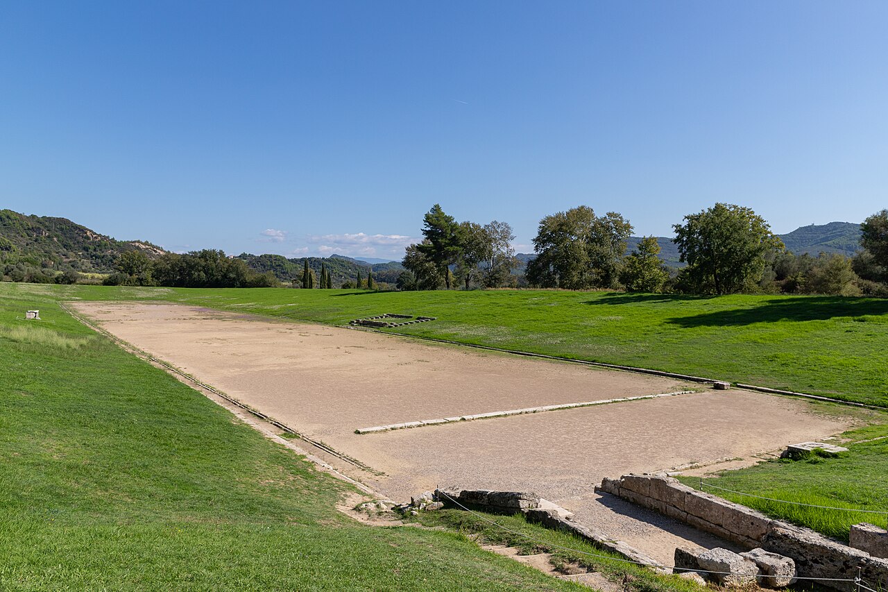 The ancient stadium of Olympia, where children love to run the track the Olympic Games began on