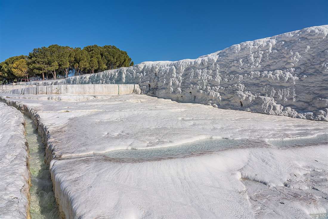 The white travertine terraces and turquoise pools of Pamukkale