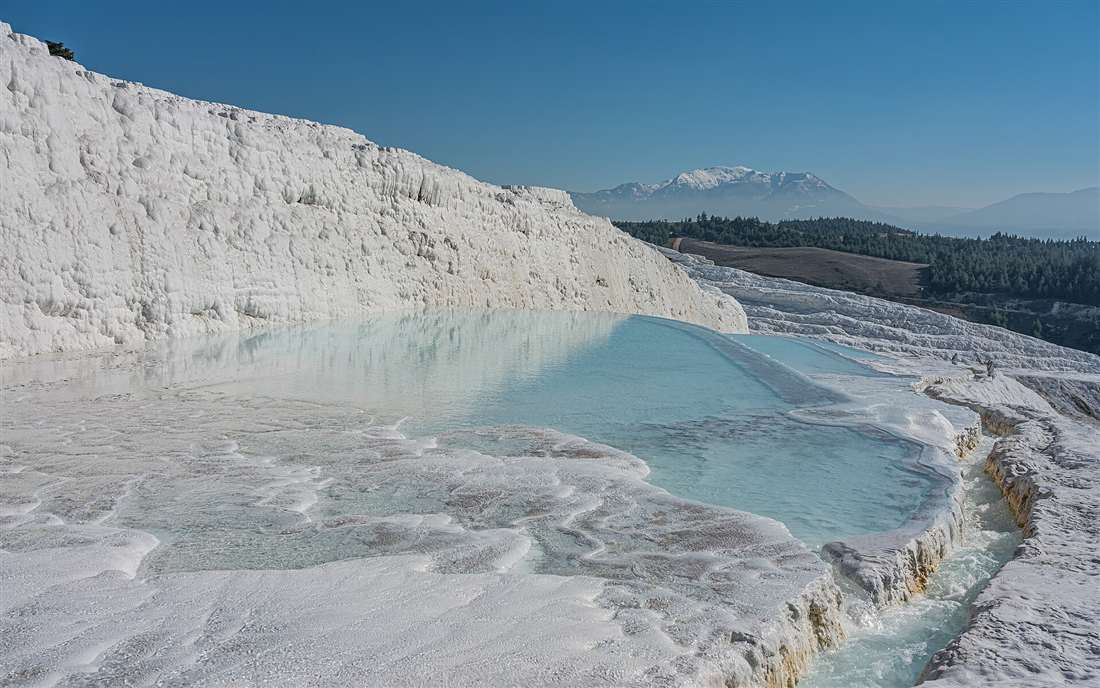 The white travertine terraces and turquoise pools of Pamukkale