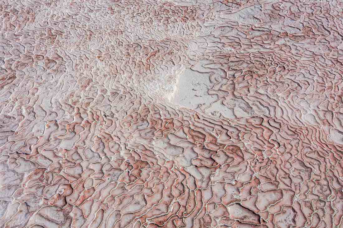 The rippled calcite texture of the Pamukkale travertine terraces