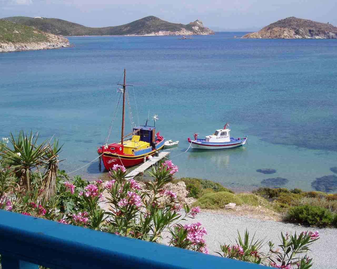 The turquoise bay and fishing boats of Livadi, Patmos