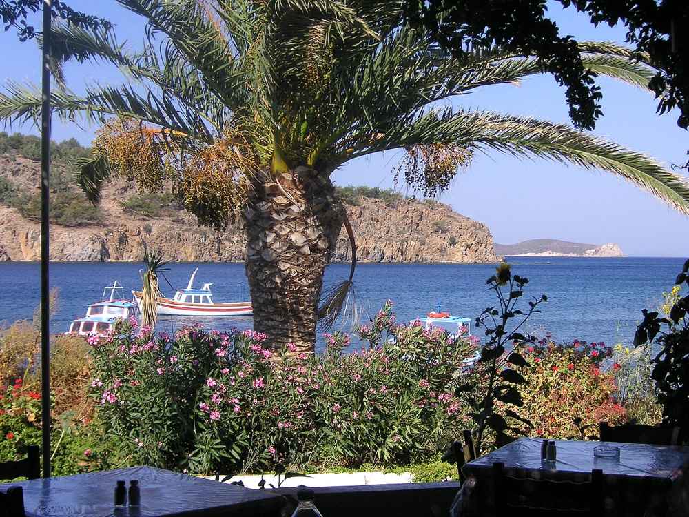 A seaside taverna view over Meloi beach, Patmos
