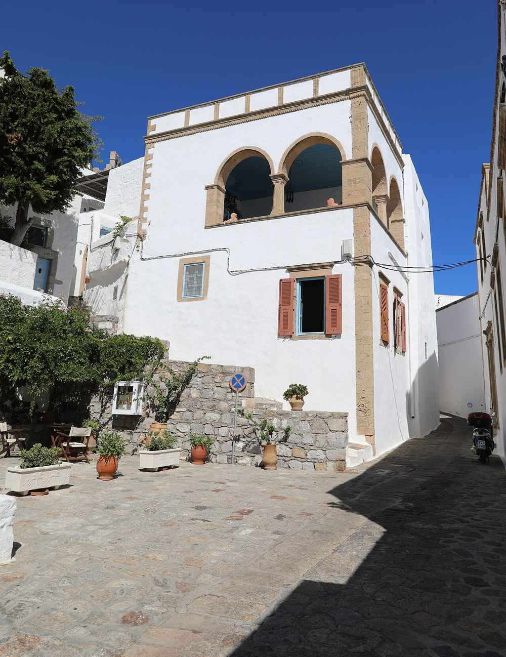 A restored captain's mansion with arched loggia in Chora, Patmos