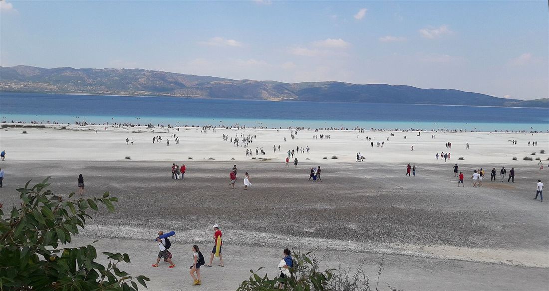The deep blue crater lake of Salda ringed by mountains
