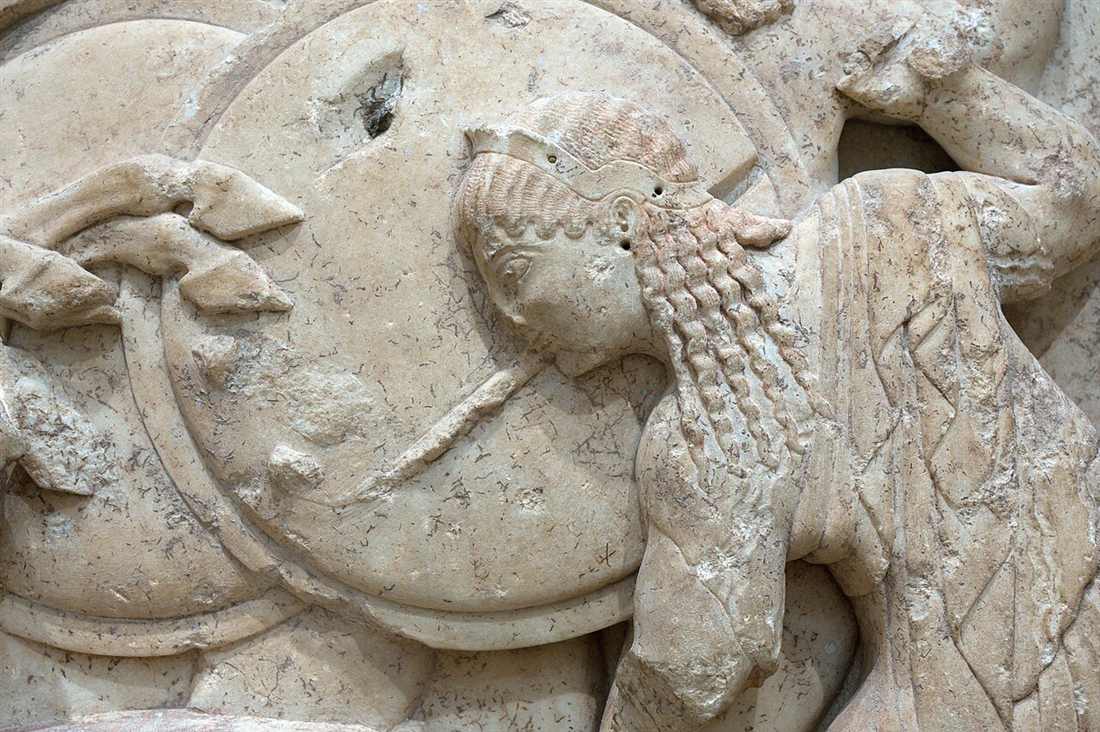 A detail of the Siphnian Treasury frieze, a helmeted warrior from the battle of gods and giants