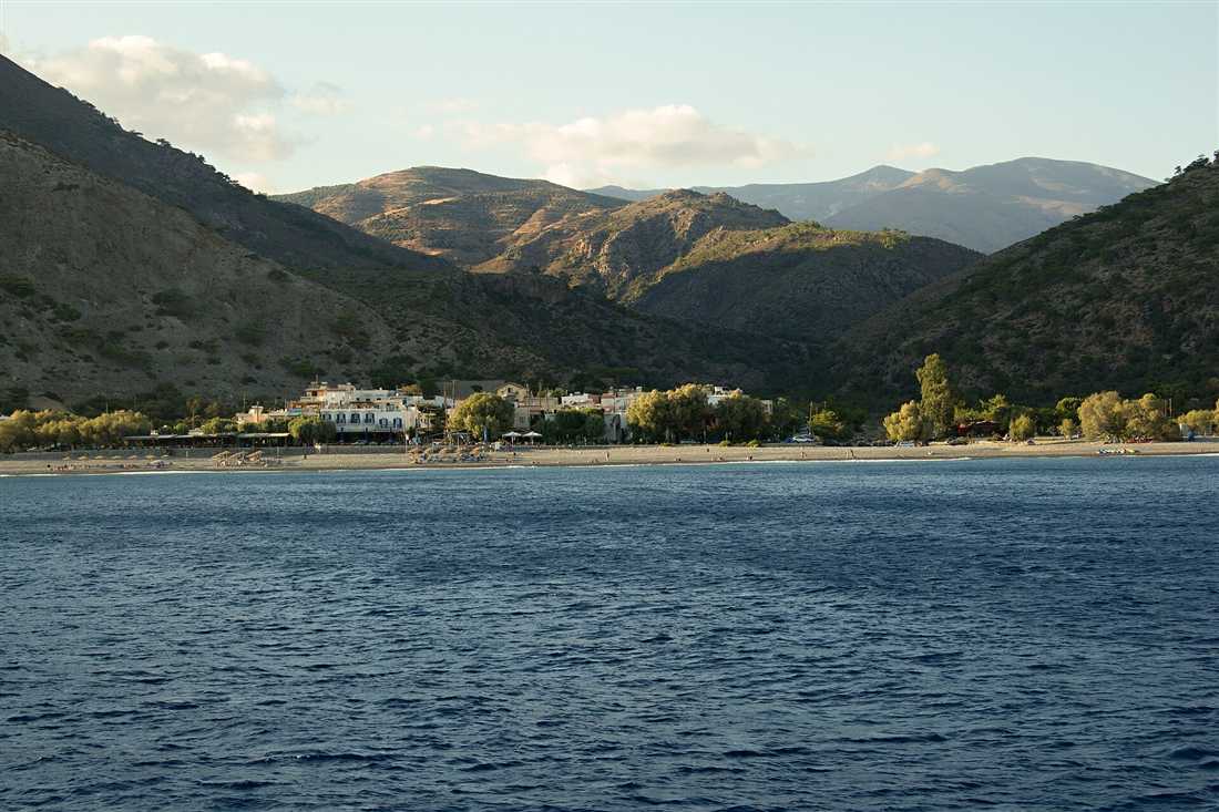 The village and long pebble beach of Sougia below the mountains on the south-west coast of Crete