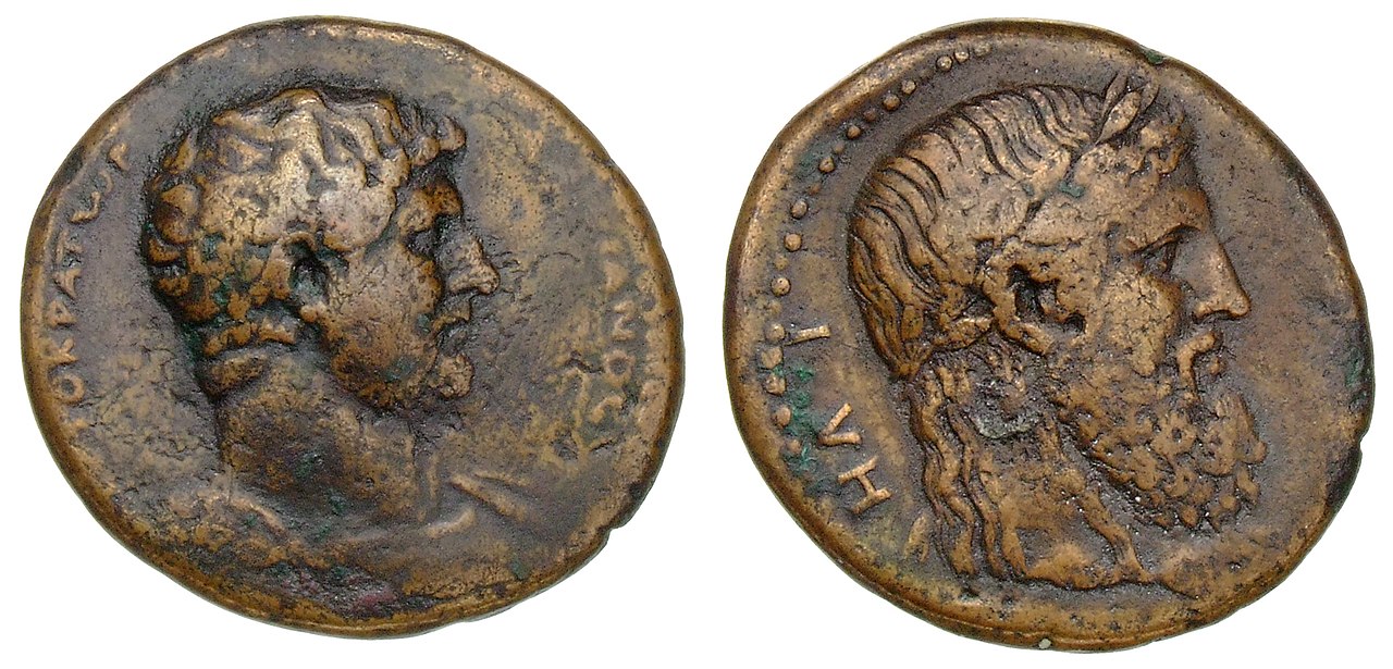 Ancient silver coin of Elis showing the Statue of Zeus by Pheidias enthroned with Nike and sceptre