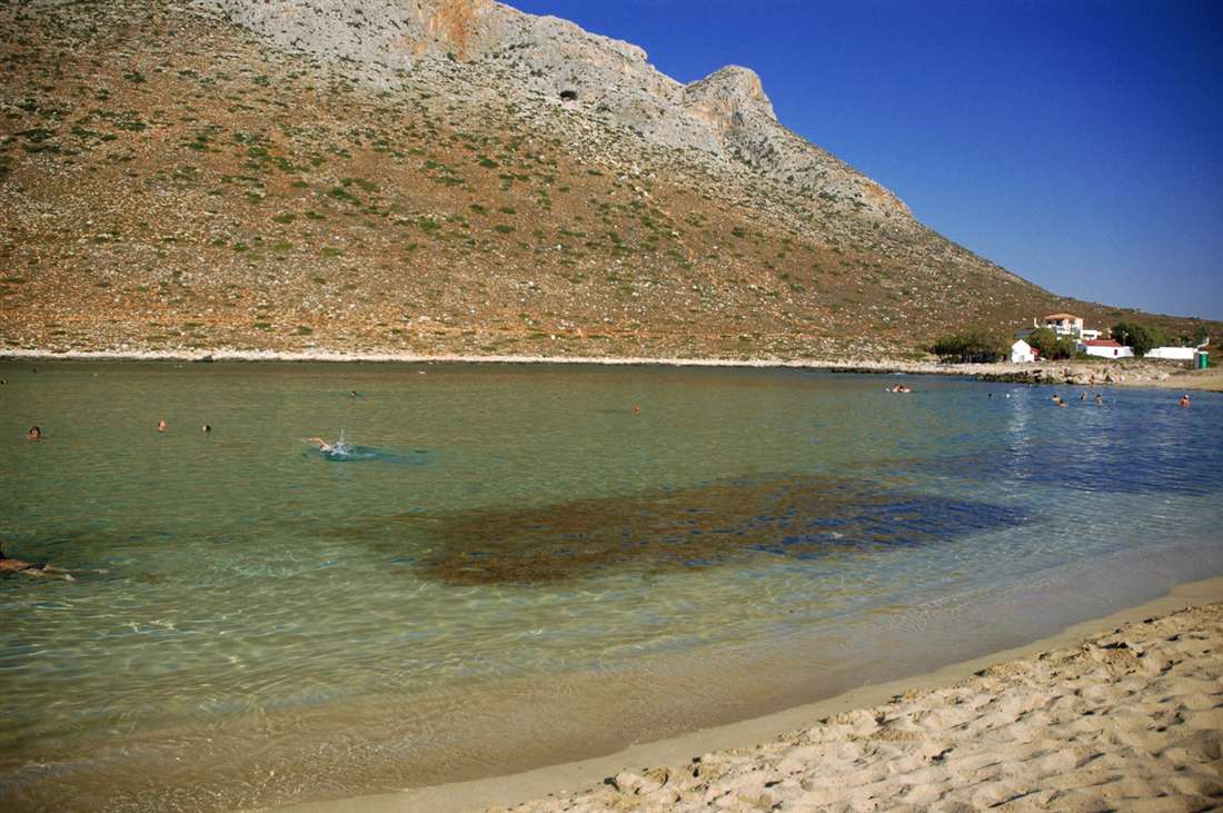 The round sheltered bay of Stavros beach under its bare mountain, the Zorba the Greek location near Chania