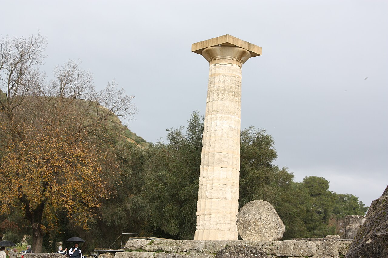 The re-erected column of the Temple of Zeus at Ancient Olympia standing among the ruins