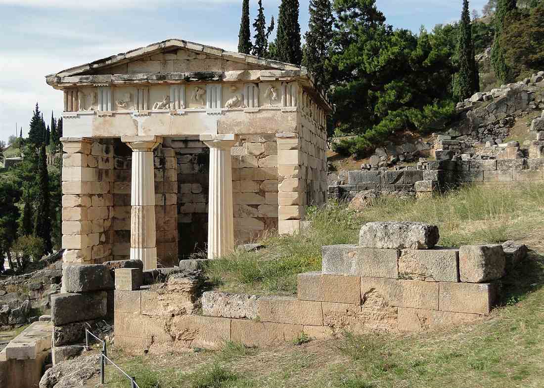 The reconstructed Treasury of the Athenians in marble on the Sacred Way at Delphi