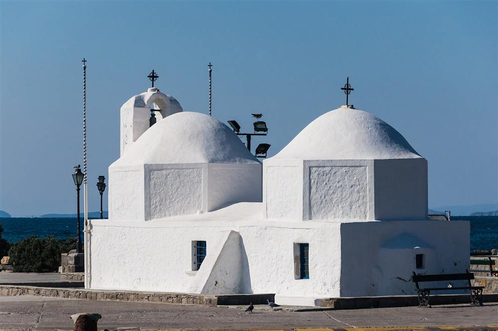 The whitewashed twin-domed chapel of Agios Nikolaos on the harbour mole of Aegina Town