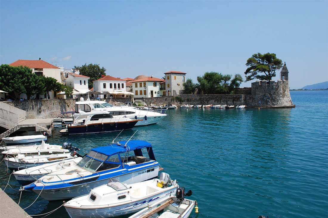 The circular Venetian harbour of Nafpaktos with its tower in Aetolia-Acarnania