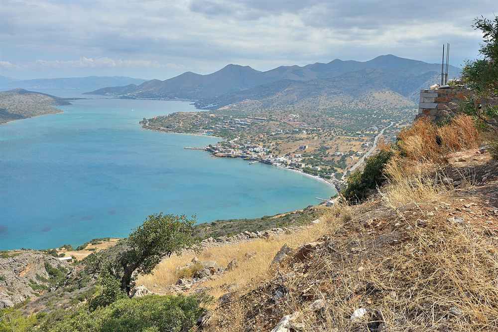 Elounda bay and the coast road running north towards Plaka on Crete