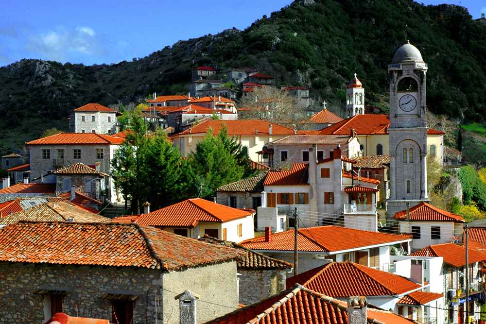 Stone houses and clock tower of Dimitsana village in Arcadia