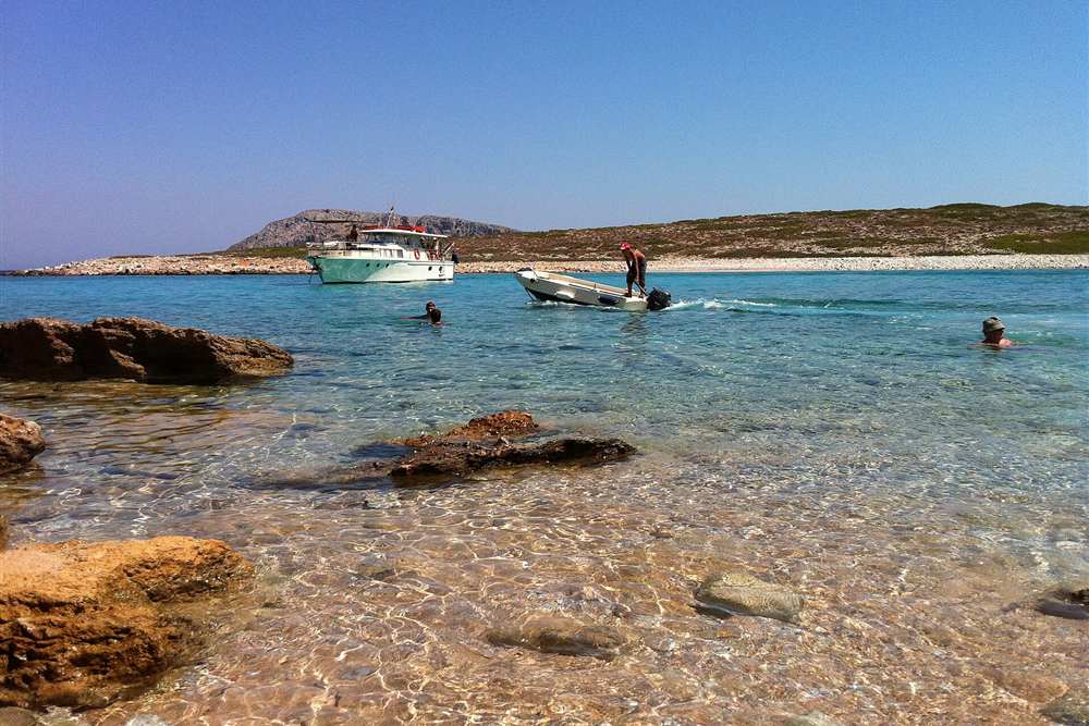 Astypalaia boat trip swim stop in the shallows of Koutsomitis