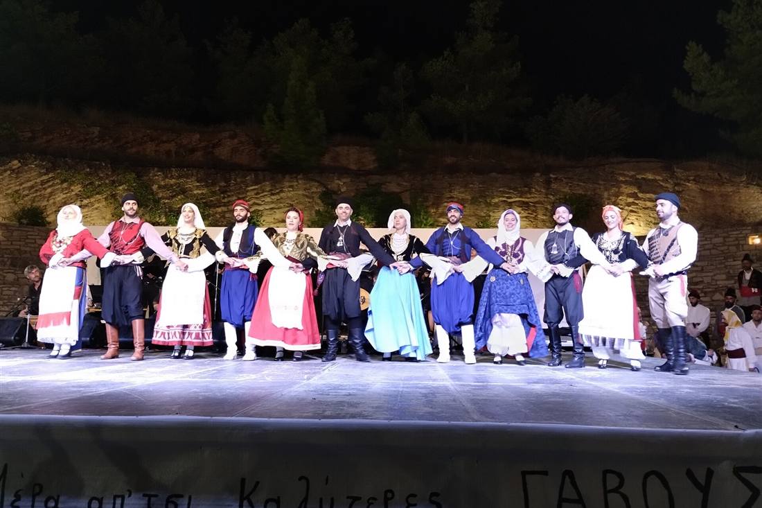 Athens Greek night: folk dancers in regional costume on stage