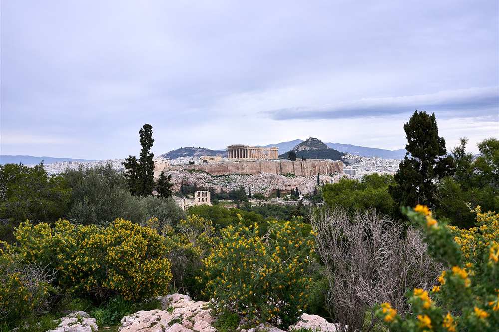 The Acropolis with Lycabettus Hill behind it, the landmark the flight circles at the start of the route
