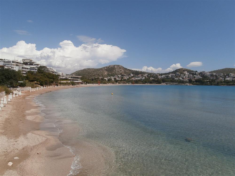 The clear turquoise shallows of Vouliagmeni beach on the Athens Riviera