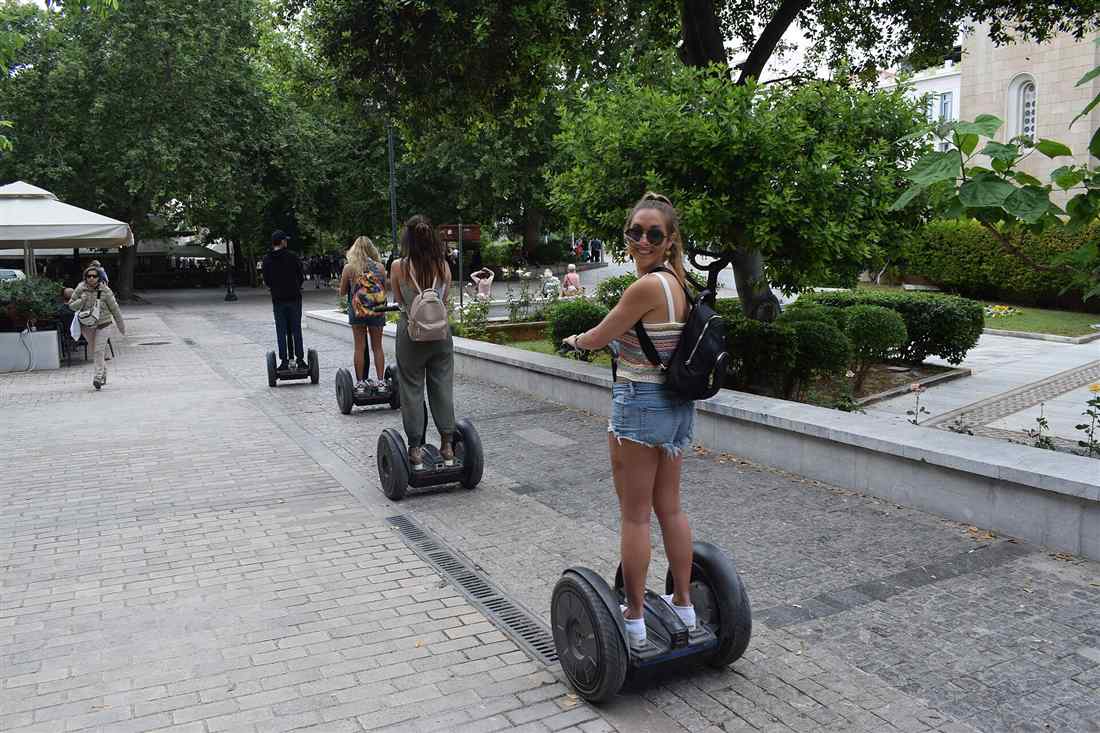 Athens segway tour group riding through a square in the historic centre