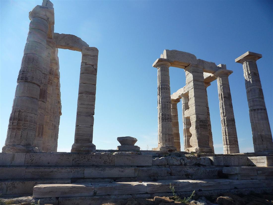 The marble columns of the Temple of Poseidon at Cape Sounion on the Athens Riviera, a sail on an Athens yacht charter