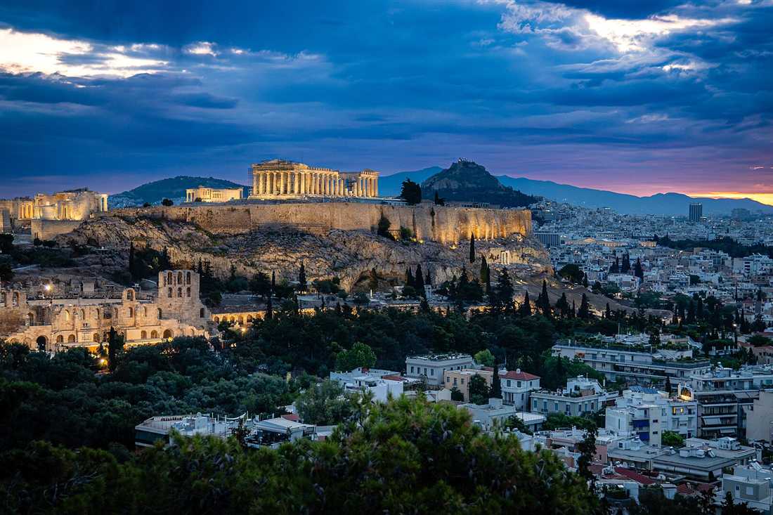 The Acropolis and Parthenon at daybreak above Athens, the view for a sunrise Athens yoga class