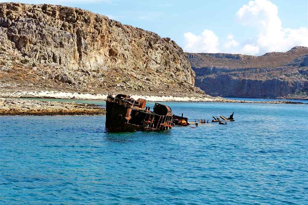 Balos boat trip view of the Gramvousa shipwreck below the island cliffs