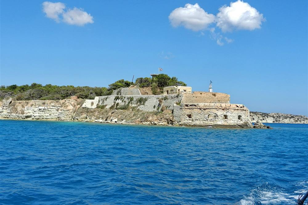 The fortress island at the mouth of Souda Bay seen from a boat off Chania