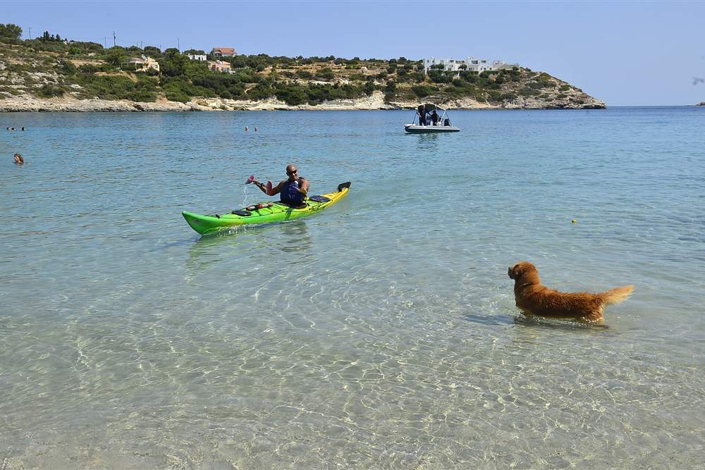 Sea kayak on clear turquoise water in Souda Bay, Chania, Crete