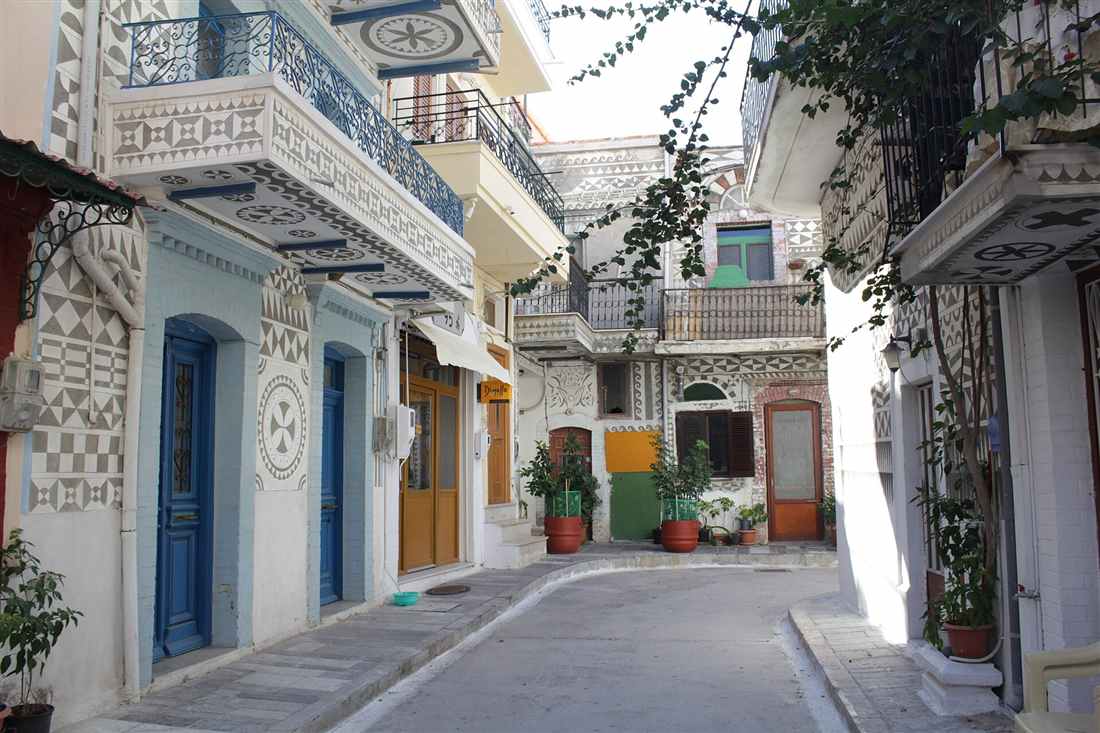 The geometric black-and-white xysta facades of Pyrgi, the mastic village on Chios reached by airport transfers from Chios Airport