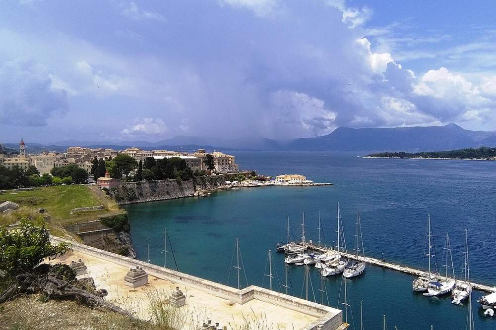 Mandraki harbour and the old town of Corfu seen from the old fortress