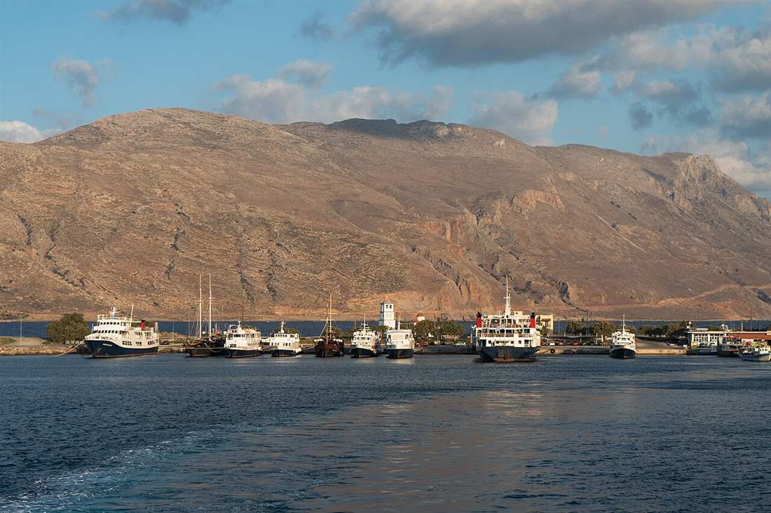 Ferries and excursion boats alongside at Kissamos port in western Crete