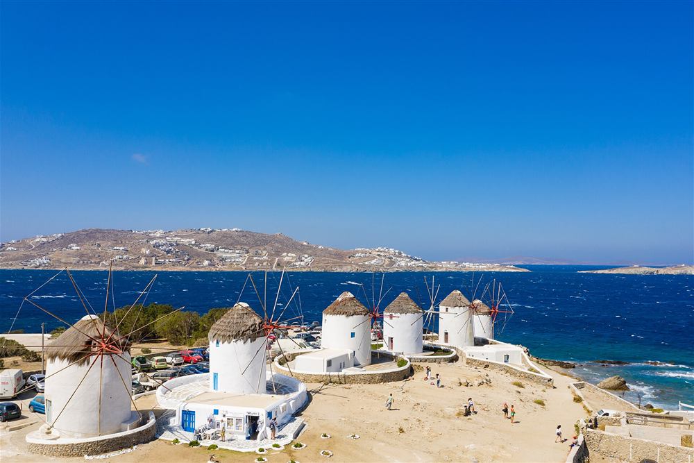 Windmills of Mykonos above the sea on a Cyclades tour