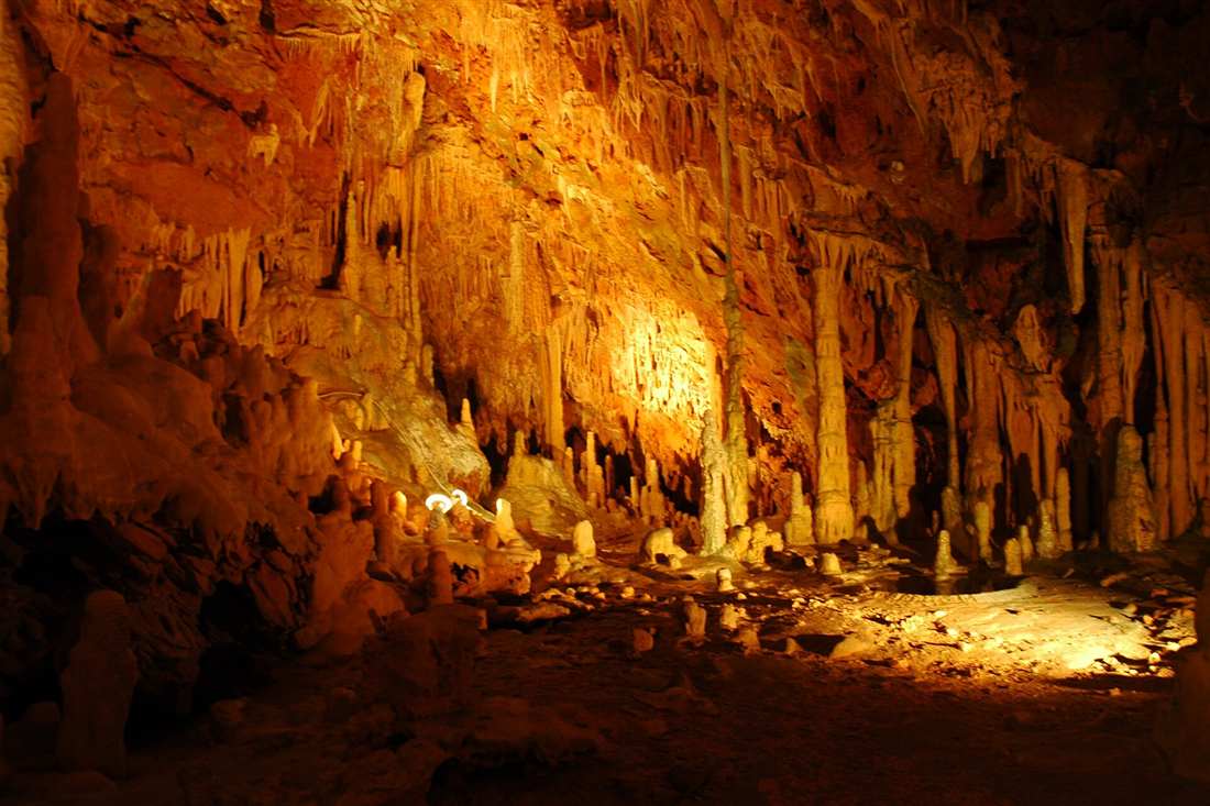 The lit stalactite galleries of the Vlychada cave at Pyrgos Dirou in Mani