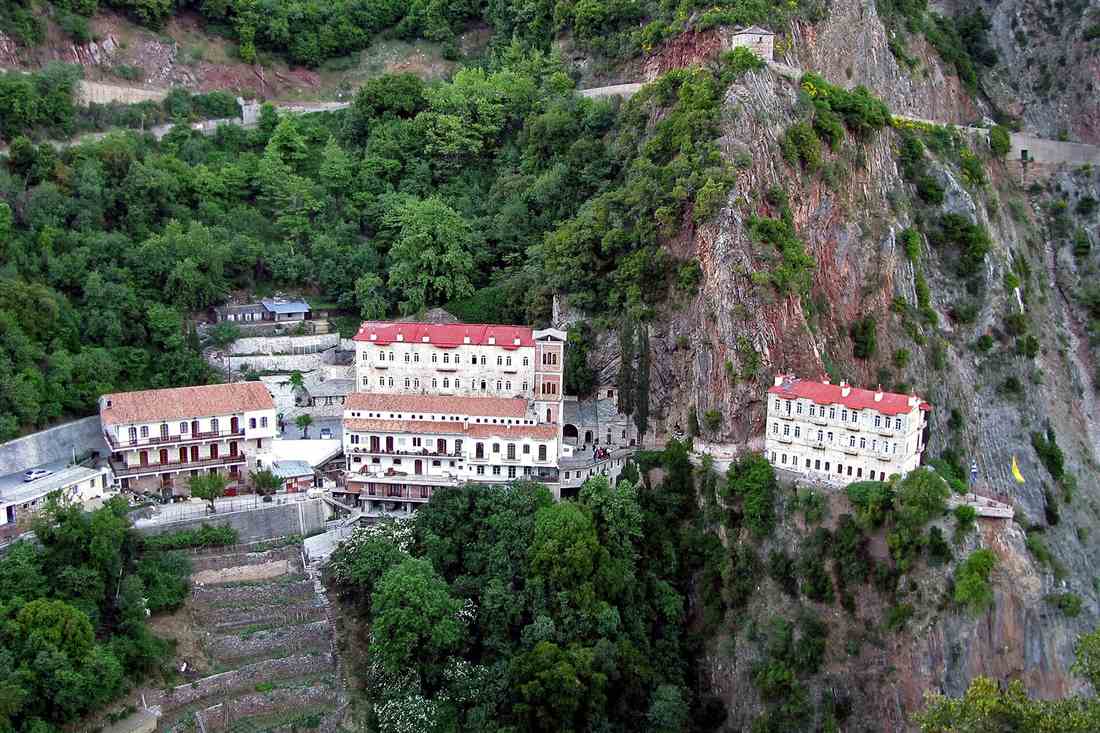 The monastery of Proussos built against the cliff in the Evrytania gorge